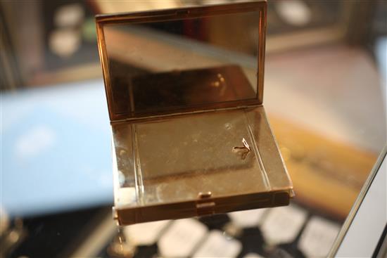 A ladys 1940s/1950s American? 14ct gold and diamond set minaudiere, 10.5cm.